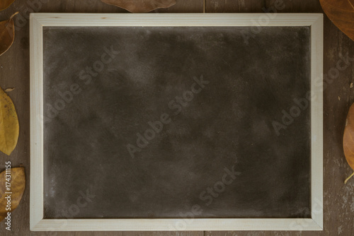 Abstract chalk blackboard with wood border frame ready used as background for add text or graphic , Tone design in Brown vintage style