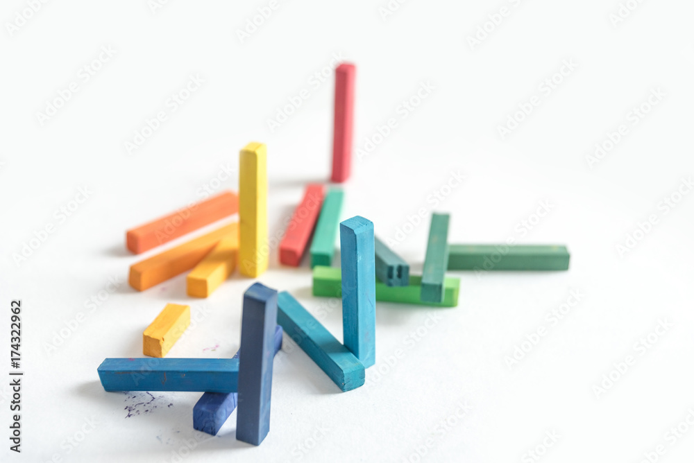 Group colored pastel chalks in a chaotic manner Group colored pastel chalks in a chaotic manner