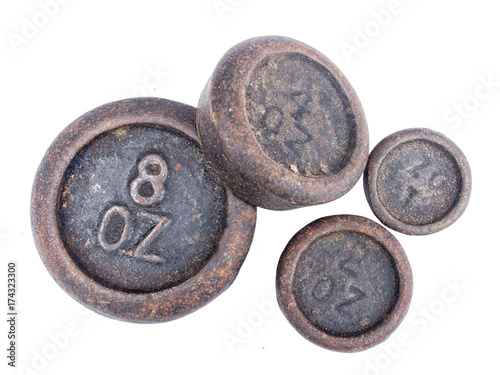 Avoirdupois. Old English weights isolated on white. Ounces. photo