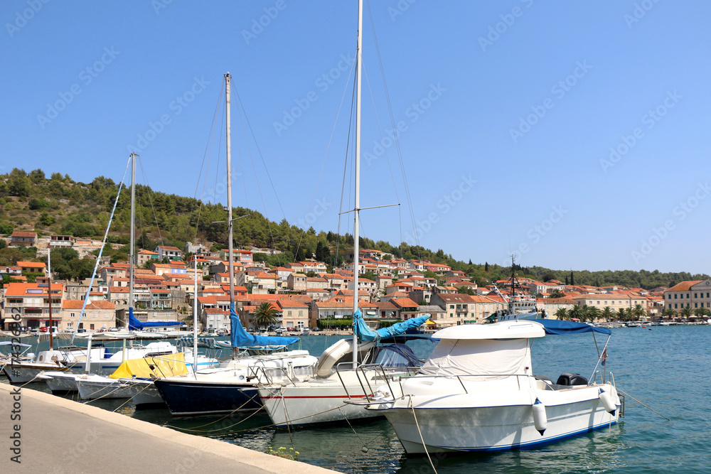 Sailing boats in Vela Luka. Vela Luka is a picturesque coastal town on Korcula Island, in Croatia. 