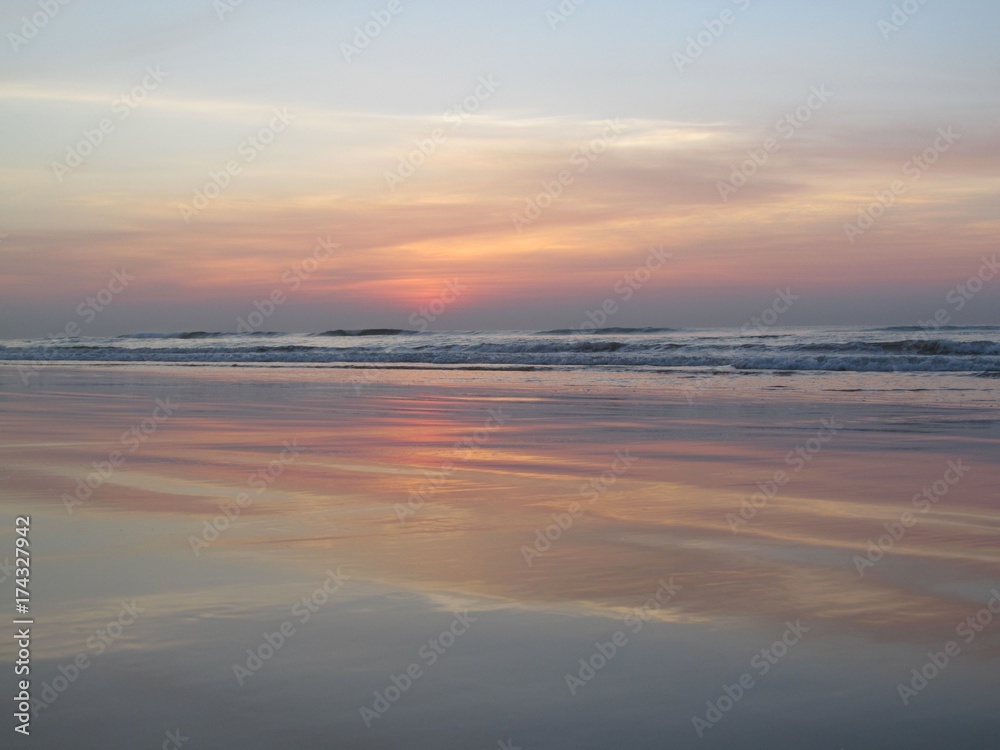 Predawn Reflection- Reflection of predawn sky on beach