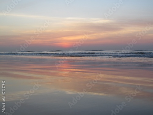 Predawn Reflection- Reflection of predawn sky on beach © KamalKumar