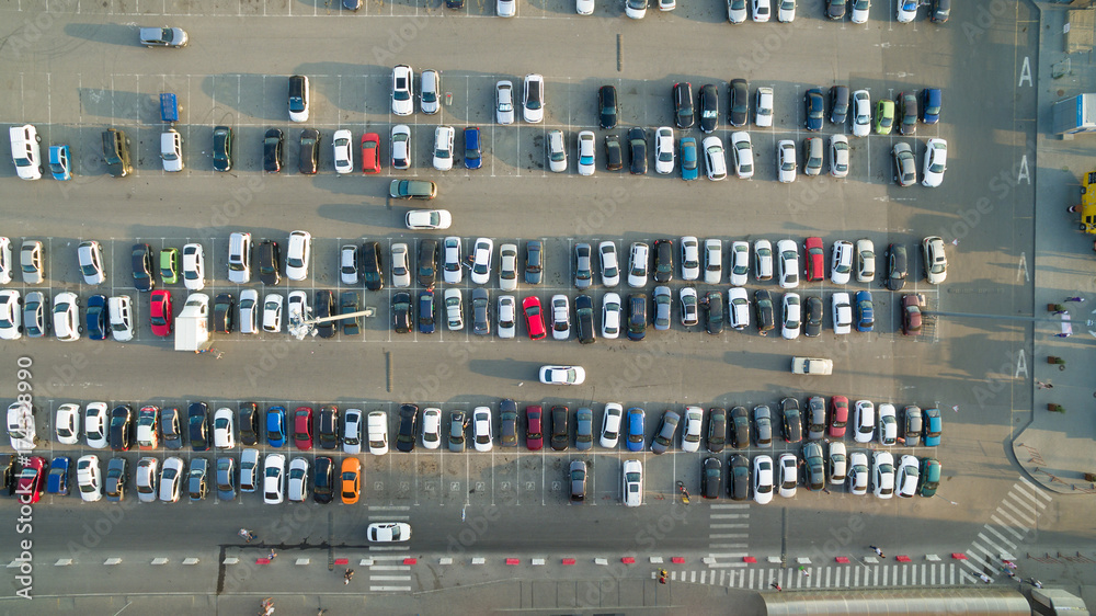 Cars in the parking lot near the shopping cente