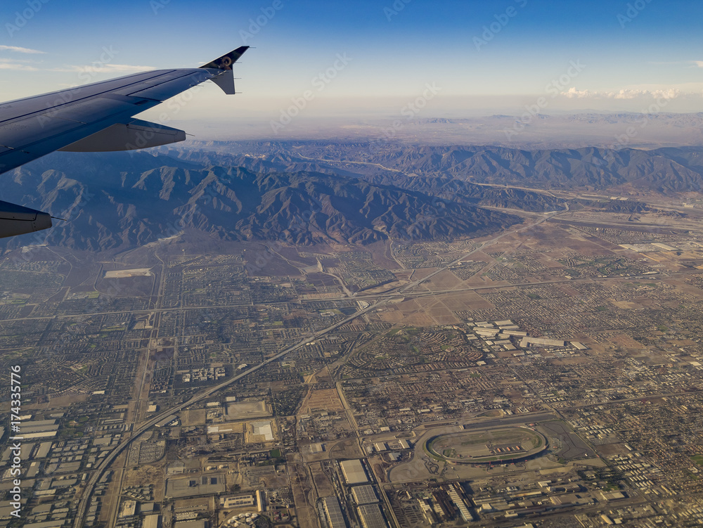 Aerial view of San Bernardino Mountains, view from window seat in an airplane Aerial view of San Bernardino Mountains, view from window seat in an airplane