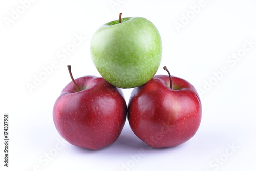 Red and green apples on a white background isolated for designer