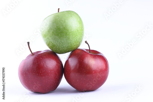 Red and green apples on a white background isolated for designer