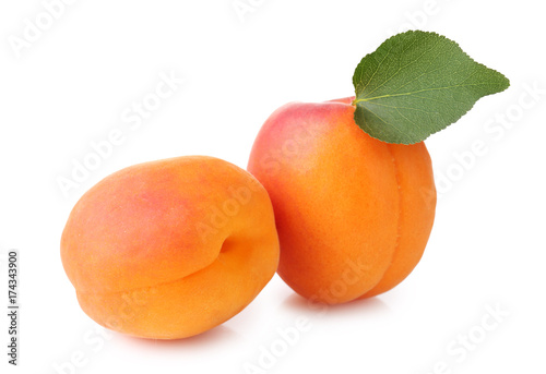 Fresh apricots on white background