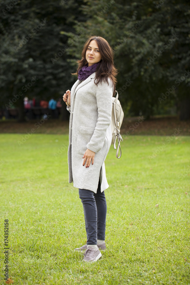 Portrait of a young beautiful woman in gray coat Portrait of a young beautiful woman in gray coat
