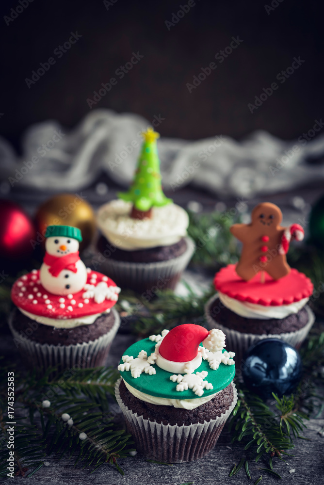 Homemade Christmas decorative cupcakes served on the table,selective focus Homemade Christmas decorative cupcakes served on the table,selective focus