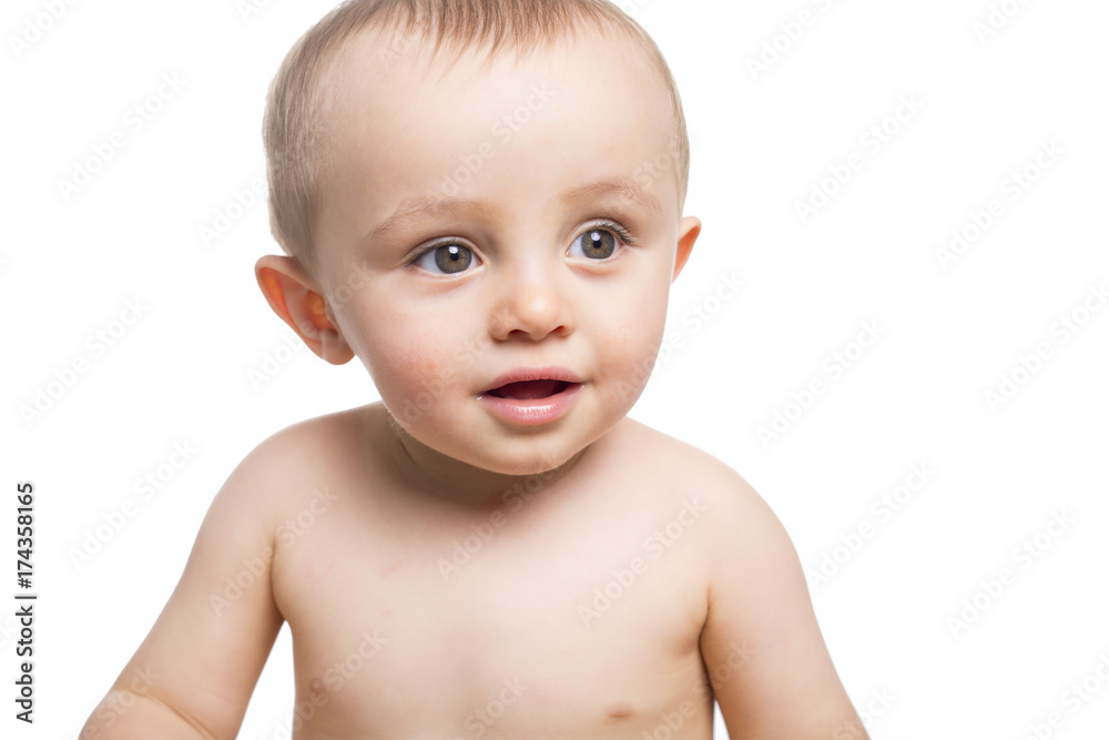 Infant child baby toddler happy looking at the corner isolated on a white background Infant child baby toddler happy looking at the corner isolated on a white background