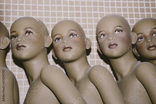 Row of mannequin children photo