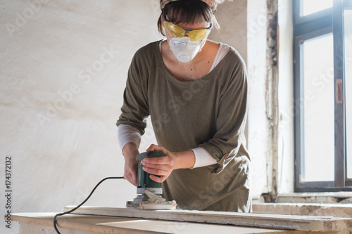 Woman renovates her apartment