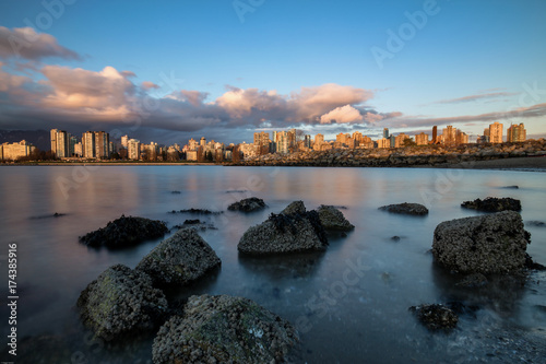 View on Downtown Vancouver during a cloudy winter sunset. Picture taken from Kits Point, British Columbia, Canada. © edb3_16
