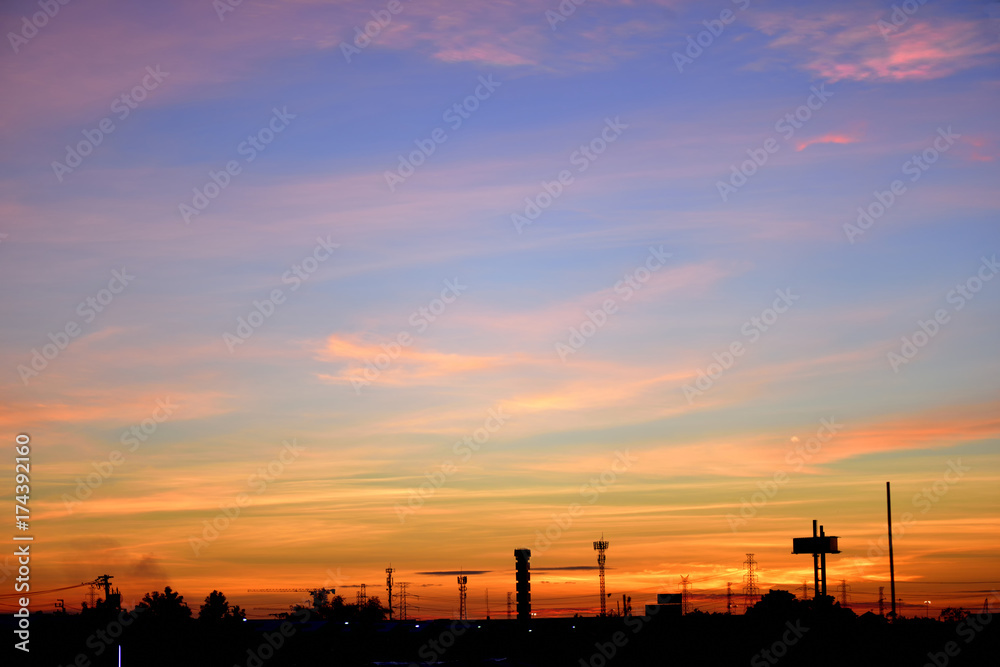 Silhouette of the electrical Pole and crane tower in Sunrise sky. Silhouette of the electrical Pole and crane tower in Sunrise sky.