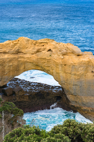 Rock arch and ocean. Nature background