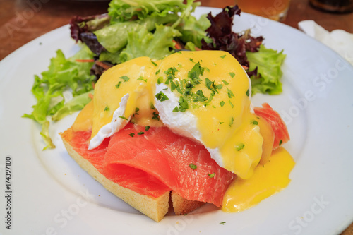 Poached egg with raw salmon