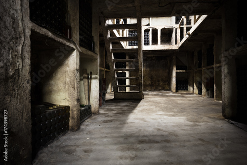 the inner part of an old wine cellar, storage place