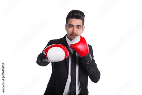 Businessman in boxing gloves holds knockout