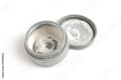 Used wax or gel hair open cap on white background