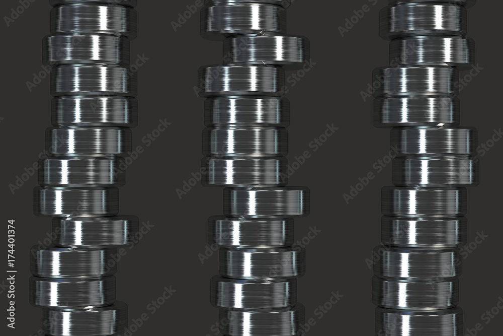 Pattern of brushed metal cylinder tablets on black background Pattern of brushed metal cylinder tablets on black background