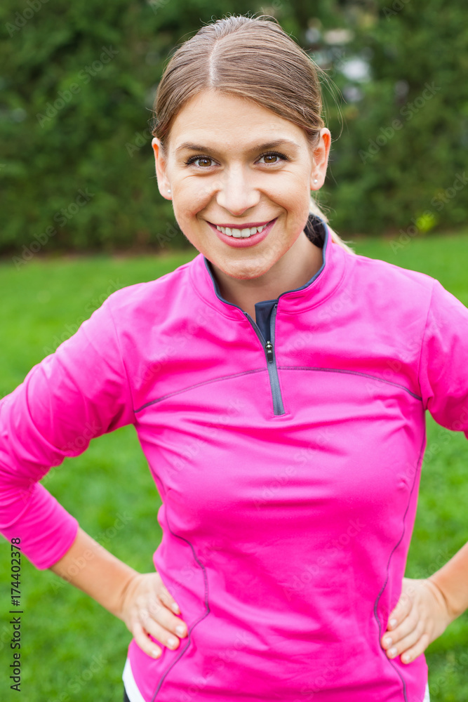 Attractive female with pink sportswear Attractive female with pink sportswear