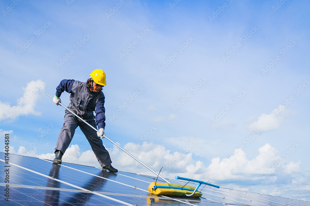 engineer checking job routine of labor working on cleaning solar panel at outside ; operation working on preventive and maintenance in solar power plant for great efficiency engineer checking job routine of labor working on cleaning solar panel at outside ; operation working on preventive and maintenance in solar power plant for great efficiency