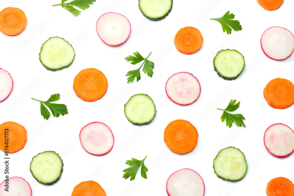 mix of sliced cucumber with sliced carrot isolated on a white background top view