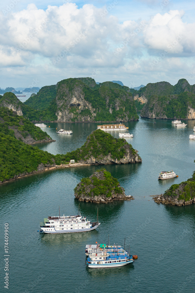 Halong bay mountain islands with cruise boats