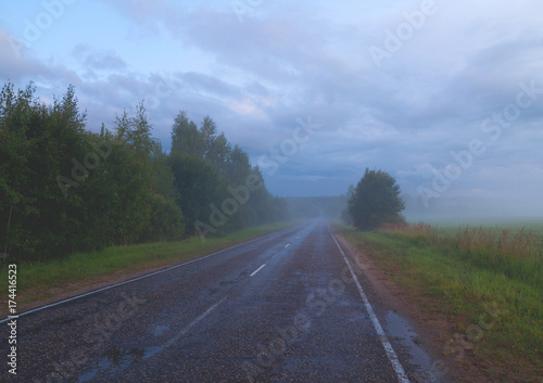 Rural country road with fog