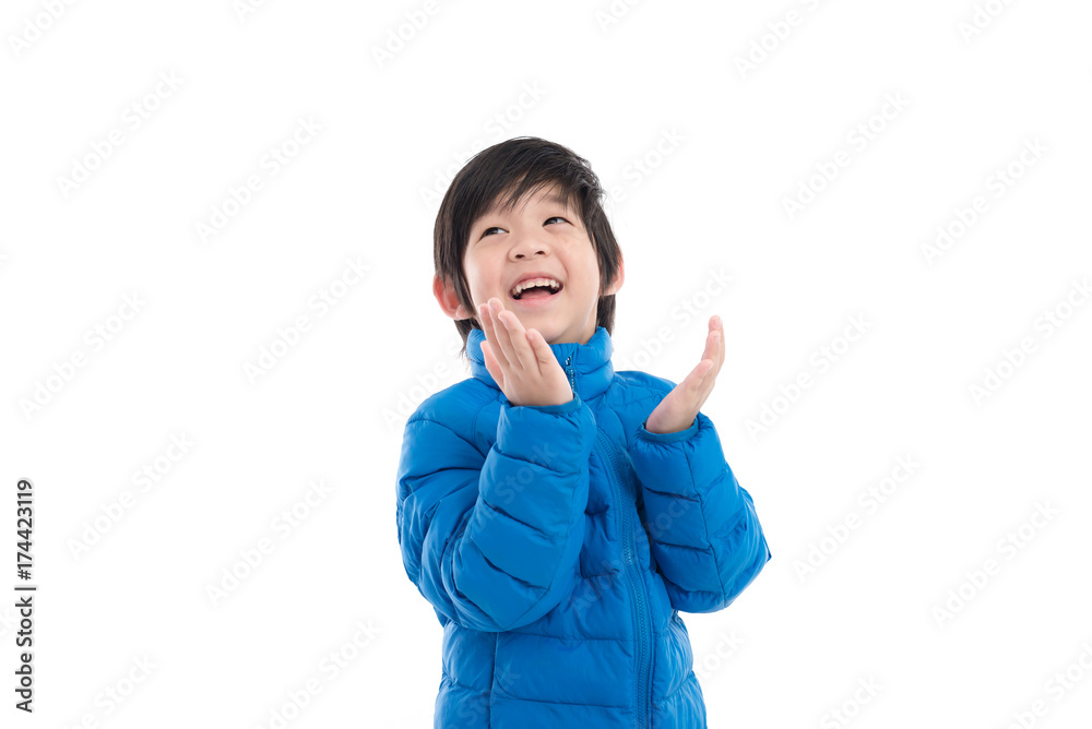 Cute Asian child in blue winter clothes open palm hand Cute Asian child in blue winter clothes open palm hand