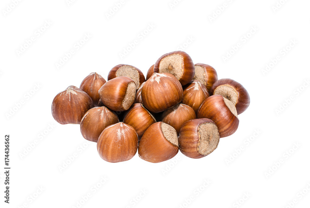 Heap of hazelnuts isolated on white background Heap of hazelnuts isolated on white background