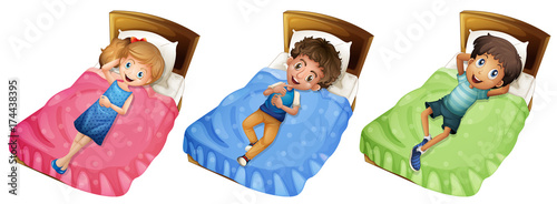 Different children relaxing on bed