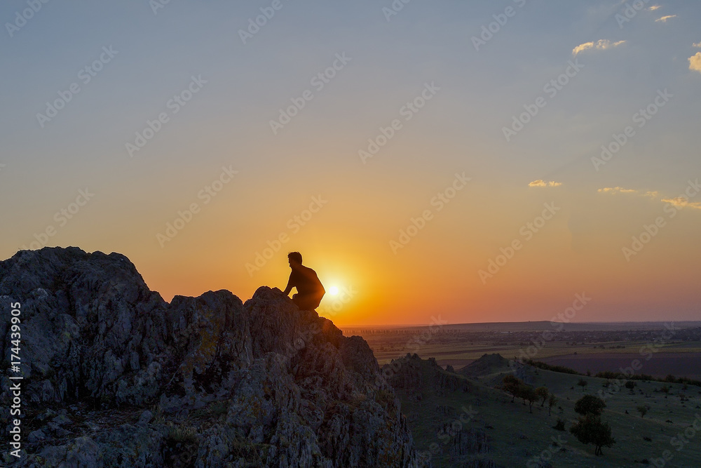Follow your dreams, silhouette of man at sunset