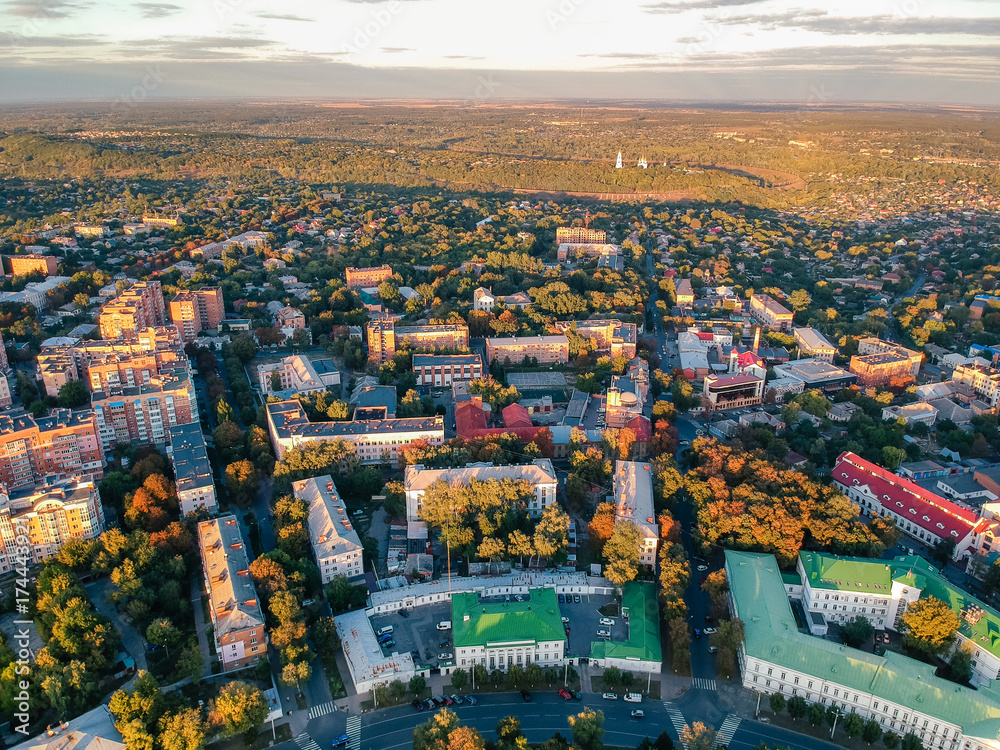 Fototapeta premium Aerial panoramic view on central park in Poltava city, Ukraine. Sunset, low light image.