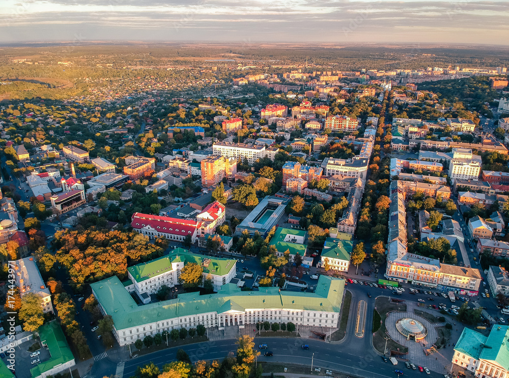 Aerial panoramic view on central park in Poltava city, Ukraine. Sunset, low light image.