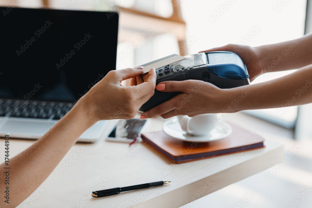 Fototapeta premium Payment with credit card and terminal