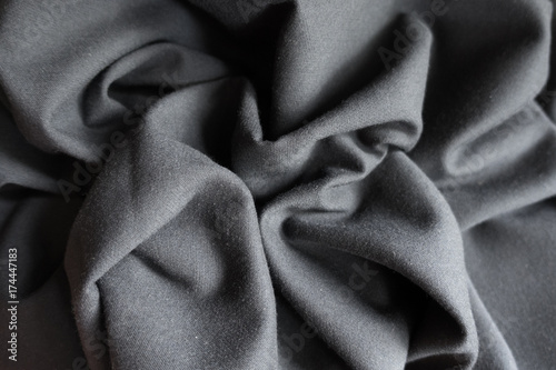 Draped simple unprinted dark grey viscose fabric