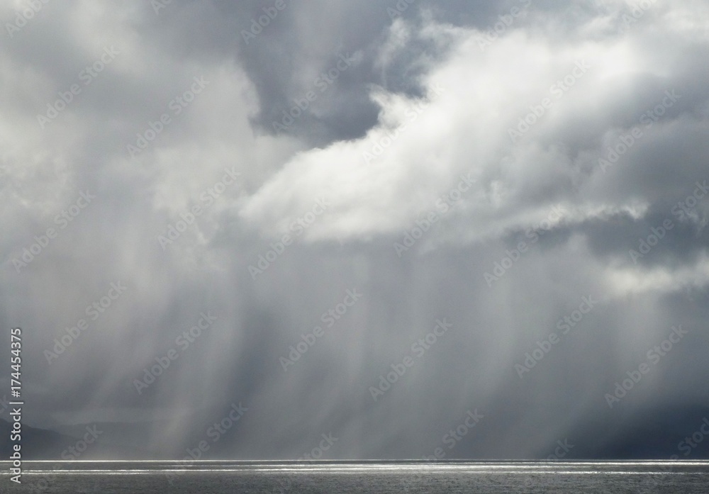 Heavy rain shower passing through between the Isle of Skye and Rum, Scotland