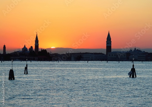 Sun at SUNSET in VENICE in Italy and the Campanile of St. Mark © ChiccoDodiFC