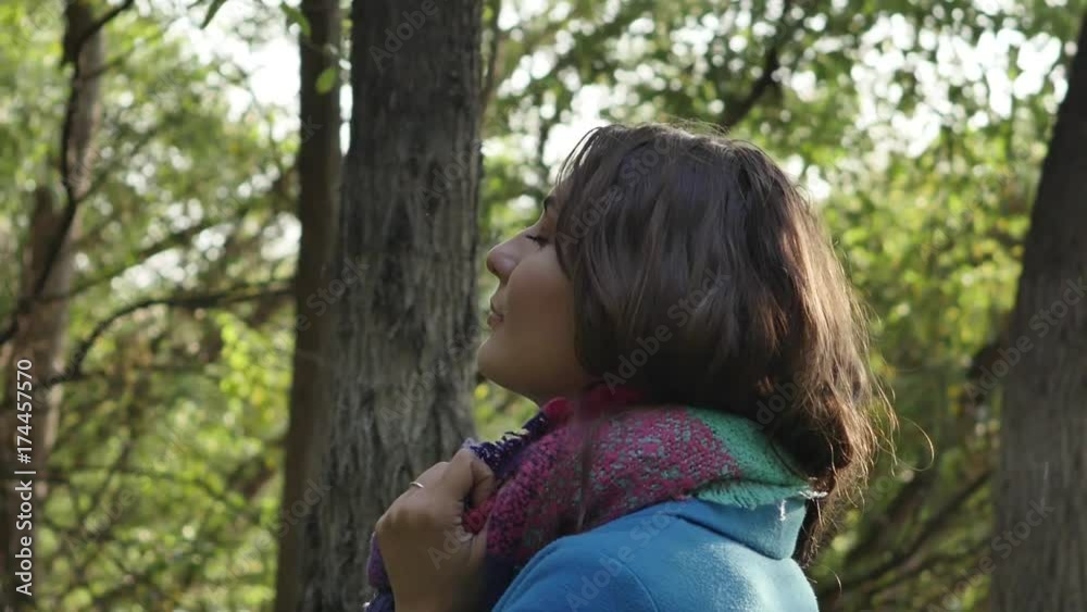 Beautiful girl walking through the autumn forest Beautiful girl walking through the autumn forest
