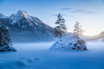 Beautiful winter landscape at frozen Lake Hintersee, Ramsau, Bavaria, Germany