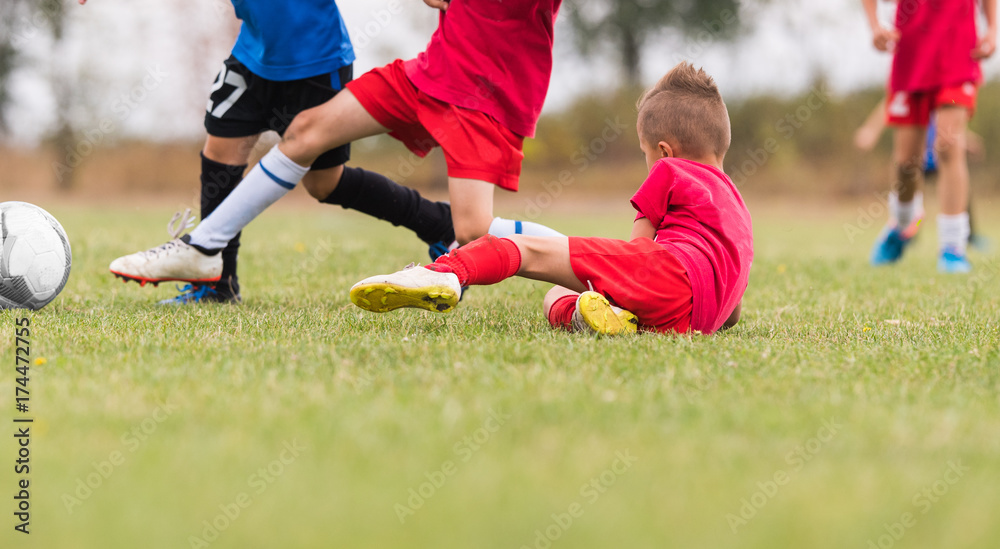 Kids soccer football - children players match on soccer field