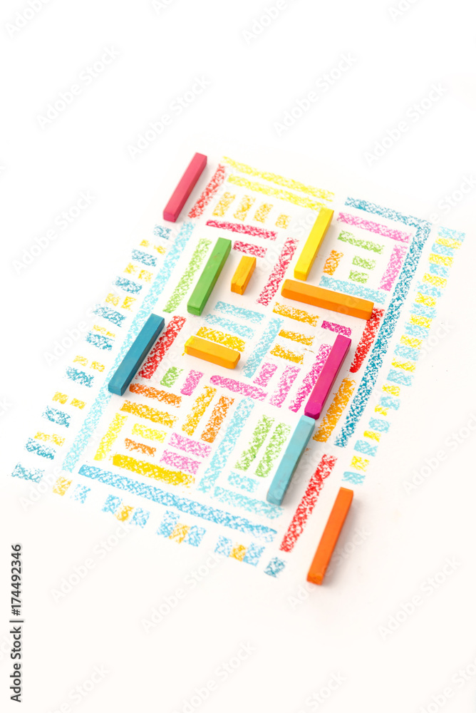 Photo of a cute geometric pattern made of colorful pastel chalks Photo of a cute geometric pattern made of colorful pastel chalks
