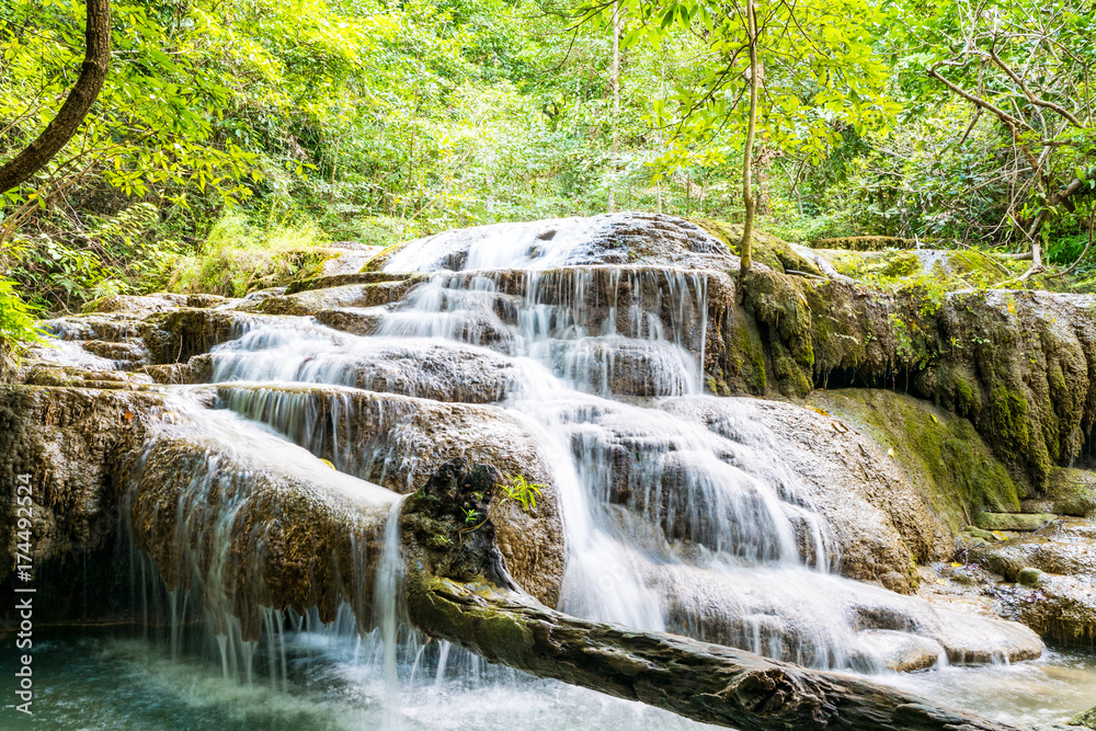 Beautiful tropical waterfall in forest, Erawan waterfall