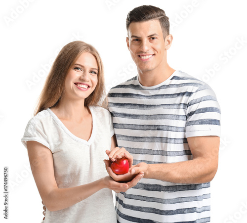 Young couple holding small ...
