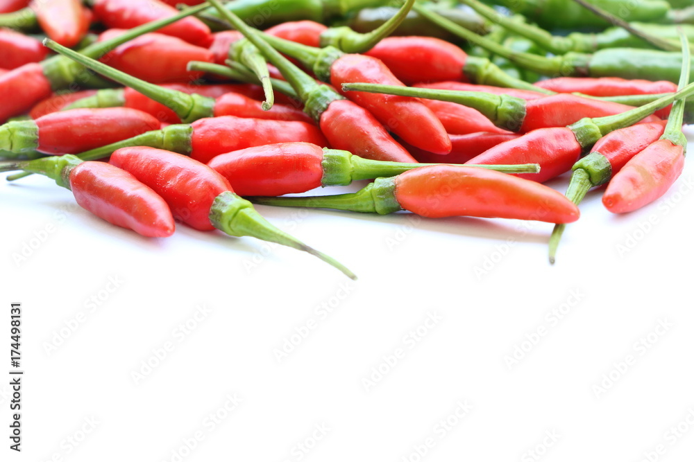 Closeup isolated red and green fresh Thai chili on white background. Have copy space for put text. Closeup isolated red and green fresh Thai chili on white background. Have copy space for put text.