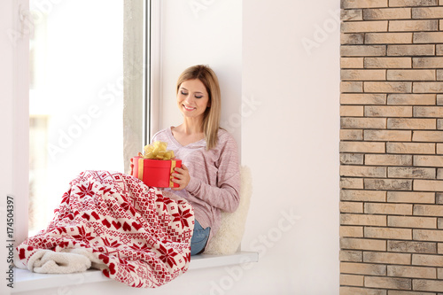 Young beautiful woman with ...