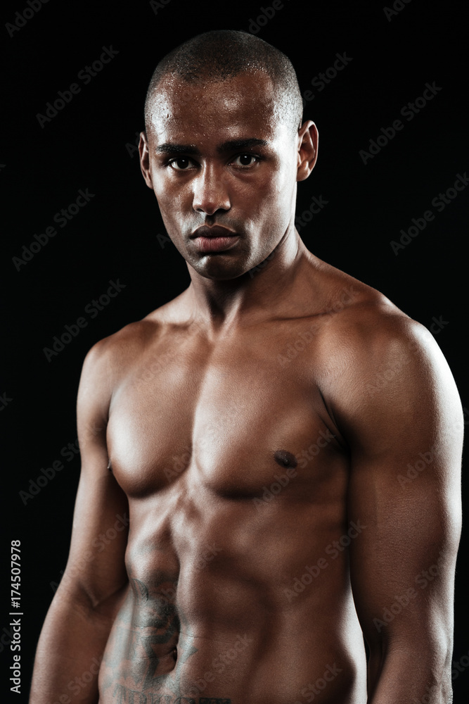 Close-up photo of afroamerican boxer resting after fight Close-up photo of afroamerican boxer resting after fight