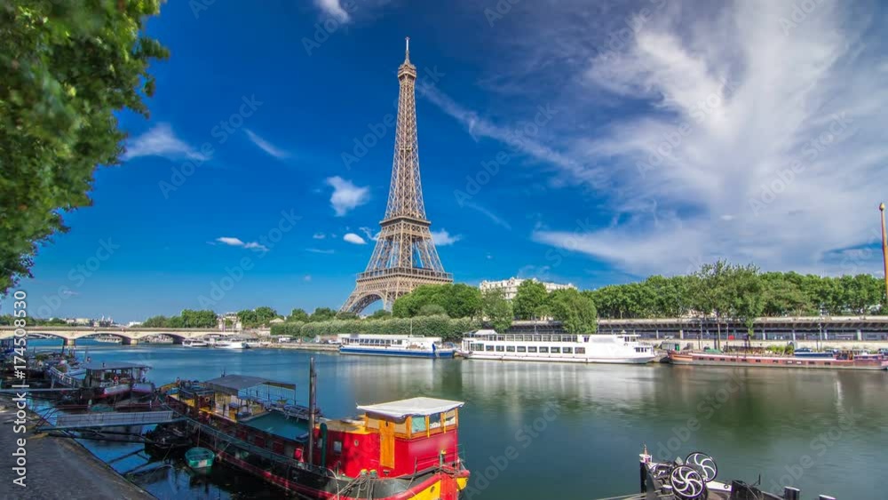 The Eiffel tower timelapse hyperlapse from embankment at the river Seine in Paris