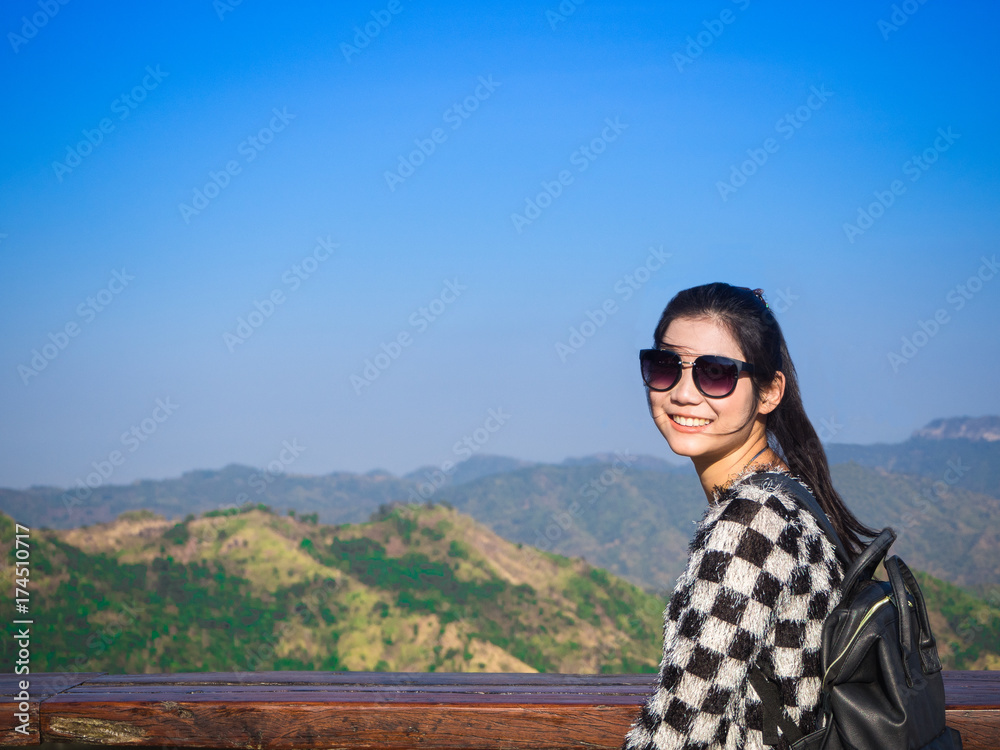 woman posing smile and nature background